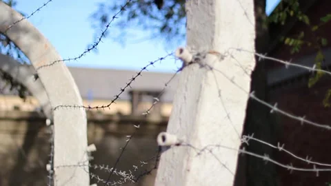 Guy walks through an abandoned building Stock Footage 130740347