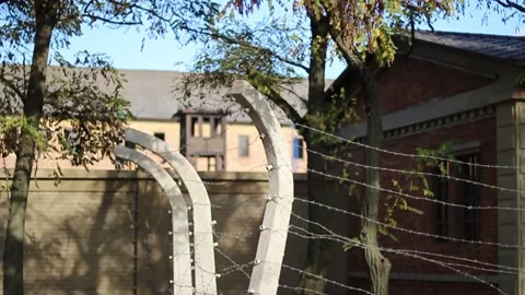 Guy walks through an abandoned building Stock Footage 130740388