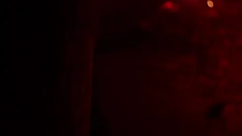 Guy walks through an abandoned building.Guy with fire 動画素材 130739269