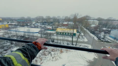 A guy walks through the open area on the top floor of the tower. Stock Footage 320666580