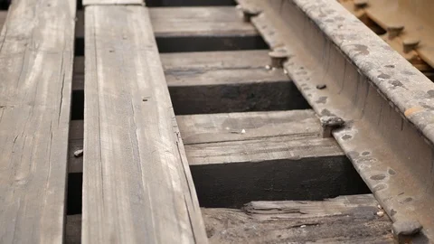The guy walks on top of the mountain and eats an Apple Stock Footage 113679971