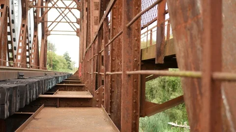 The guy walks on top of the mountain and eats an Apple Stock Footage 113679976