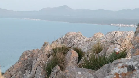 The guy walks on top of the mountain Stock Footage 112858189
