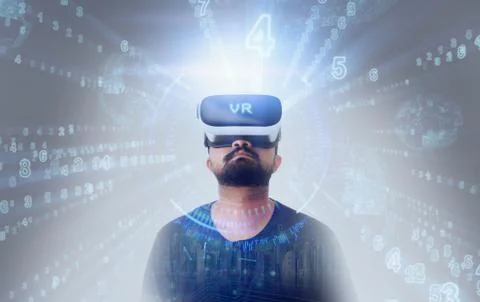 Guy wearing VR Virtual Reality glasses - Word VR Stock Photos