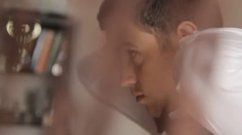 The guy in the white  strict shirt puts bow tie Stock Footage 42857508