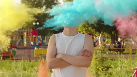 A guy in a white tank top and sunglasses stands with his arms crossed, Holly's Stock Footage 135870860