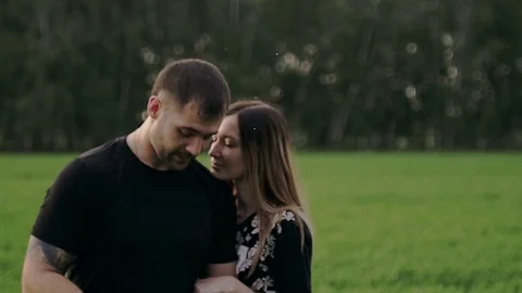 Guy winds the thread on the holder and talks Stock Footage 79605932