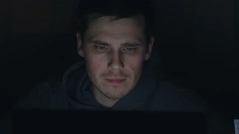 Guy working on computer at night. Stock Footage 232705747