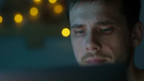 Guy working on computer at night. Stock Footage 260451669