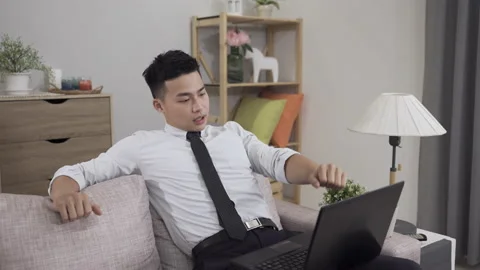 Guy working from home is typing on computer Stock-Footage 163693696