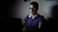 guy working at the laptop and surfing in internet HD Footage