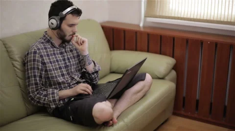 A guy working on a laptop. Stock Footage 62356644
