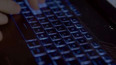 Guy working on laptop at home at night Stock Footage 293649082