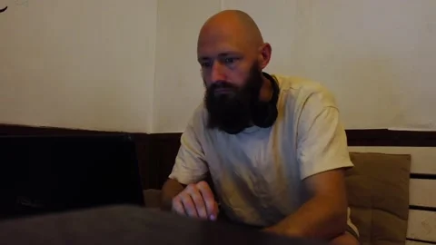 Guy working on a laptop indoors Stock Footage 219437179