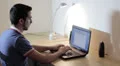 guy working at the laptop - write a letter HD Footage