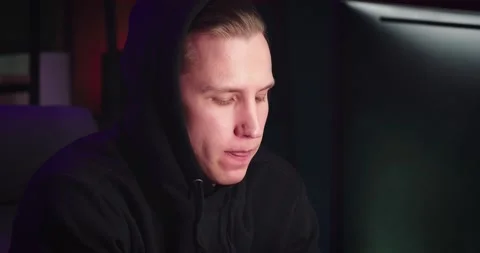 The guy works at the computer close-up Video stock 174725965