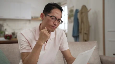 Guy worrying about money problem at home Stock Footage 251190052