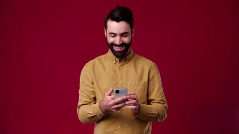 Guy writes a message on the phone Stock Footage 165620731