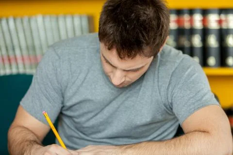 Guy writing 写真素材