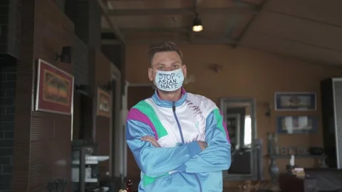 The guy wrote the challenge and the call in support of "Stop Asian Hate" Stock Footage 151334713