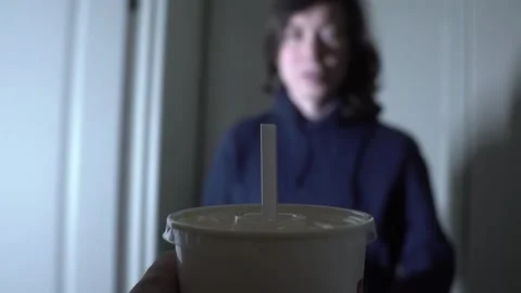 Guy young man drinks cola straw in the kitchen Video stock 142397867