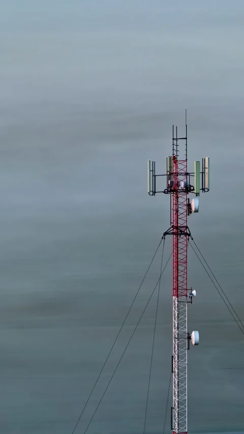 Guyed Lattice Telecommunication Tower for Wireless Infrastructure Stock Footage 339766748