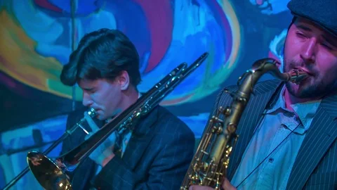 Guys are playing different musical instruments Stock Footage 112199883