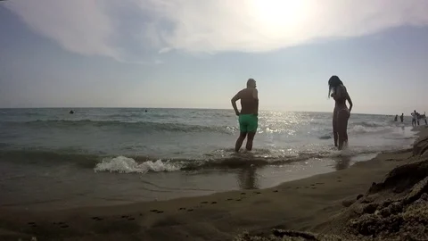 Guys on the beach Stockbeeldmateriaal 99465944