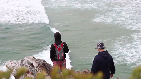 Guys on cliff Stock Footage 199219875