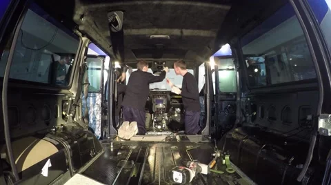 Guys do soundproofing machines timelapse Stock Footage 56561053