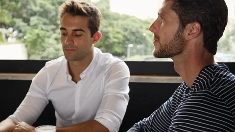 Guys drinking coffee Stock Footage 93874356