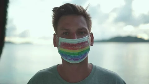 The guy's face close-up on a blurred background Stock Footage 154287871