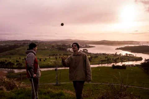 Guys having fun with a nice sunset Stock Photos