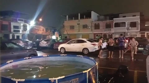Guys Holding Hands Jump Into Pool, One Doesn't Quite Make It, Guayaquil, Ecuador Stock Footage 329248532