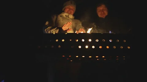 Guys make fire for barbecue Video stock 231707252