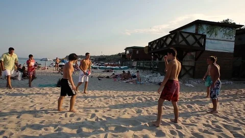 Guys playing volleyball Stock Footage 70146357