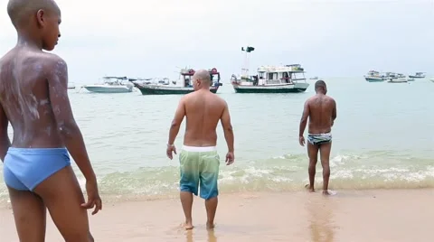 Guys on Praia do Forte Beach in Bahia, Brazil Stock Footage 44172116