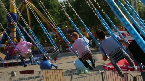 Guys ride on the carousel Stock Footage 42684140