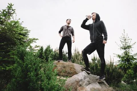 Guys on the run Stock Photos