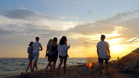 Guys walk on a beach. Stock Footage 93563581