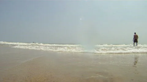 Guys Walking Into the Ocean 스톡 동영상 728643