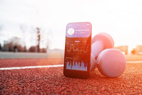 Gym application. Smart phone screen with fitness health or sport gym mobile a Stock Photos