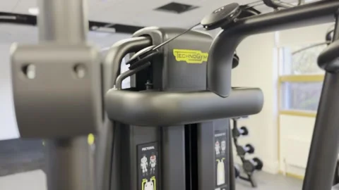 Gym Equipment pull focus bar cable machine Stock Footage 303083310