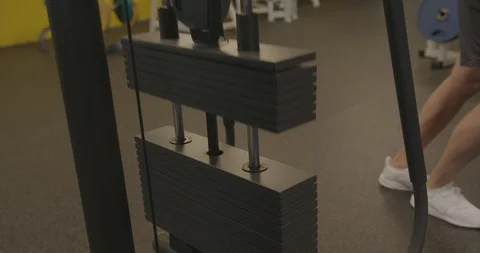 Gym equipment, pulling up weights Stock Footage 93706270