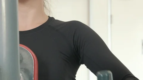 Gym Female machine row Stock Footage 87448184