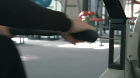 Gym Female rowing machine 2 Stock Footage 87448146