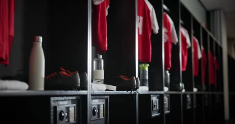 Gym, interior and empty locker room with sport jersey, water bottle and fitness Stock Footage 280656721
