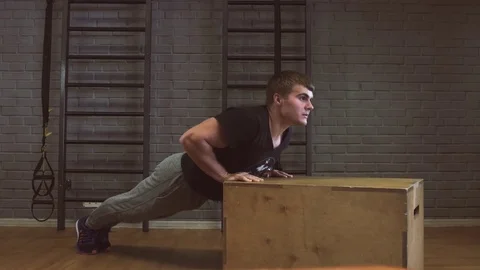 Gym man push-up strength pushup in a fitness workout Stock-Footage 74370570