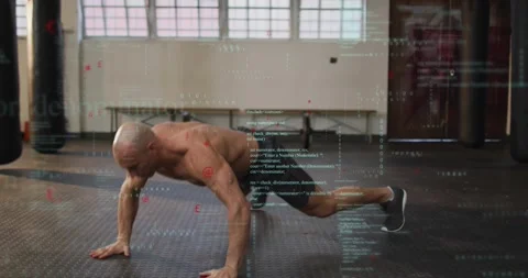 Gym trainer pressing up from low push, rotating and building power while HUD Vídeos de archivo 323386151