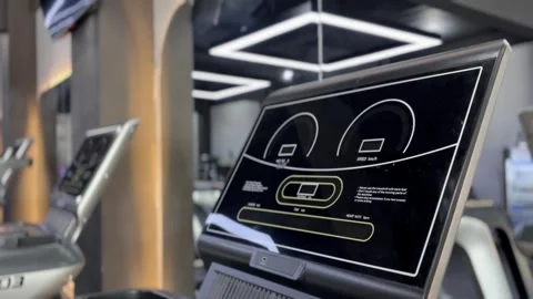 Gym Treadmill Console Display in Focus, Exercising for a Strong Body Stock Footage 307795921